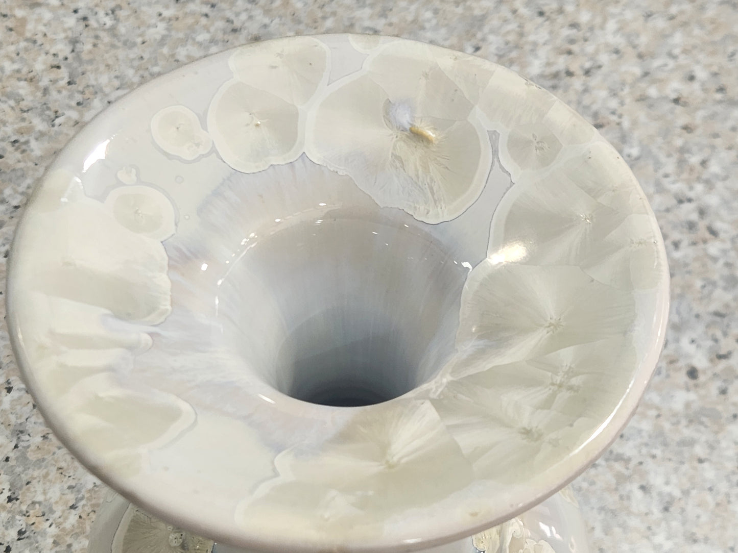 top rim of crystalline vase showing the opal like effect of the glaze.