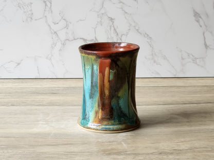 Wheel thrown ceramic coffee mug with earthy landscape inspired glaze