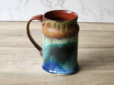 Side view of ceramic mug highlighting handle shape and ergonomic grip
