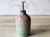 Small ceramic oil and vinegar bottle in sage green and blush glaze, handmade