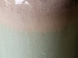 Close up of Ombre glazed ceramic bottle for olive oil, handmade pottery kitchen accessory