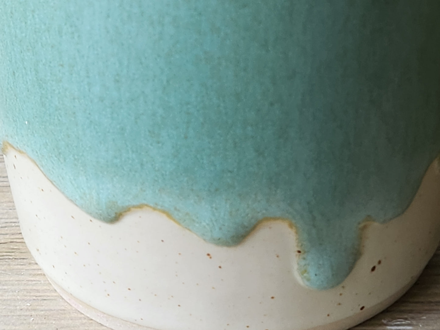 Refillable ceramic oil and vinegar bottle in soft green glaze, handmade