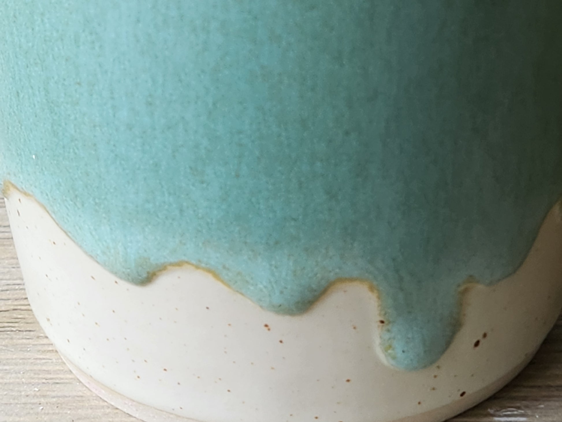Refillable ceramic oil and vinegar bottle in soft green glaze, handmade