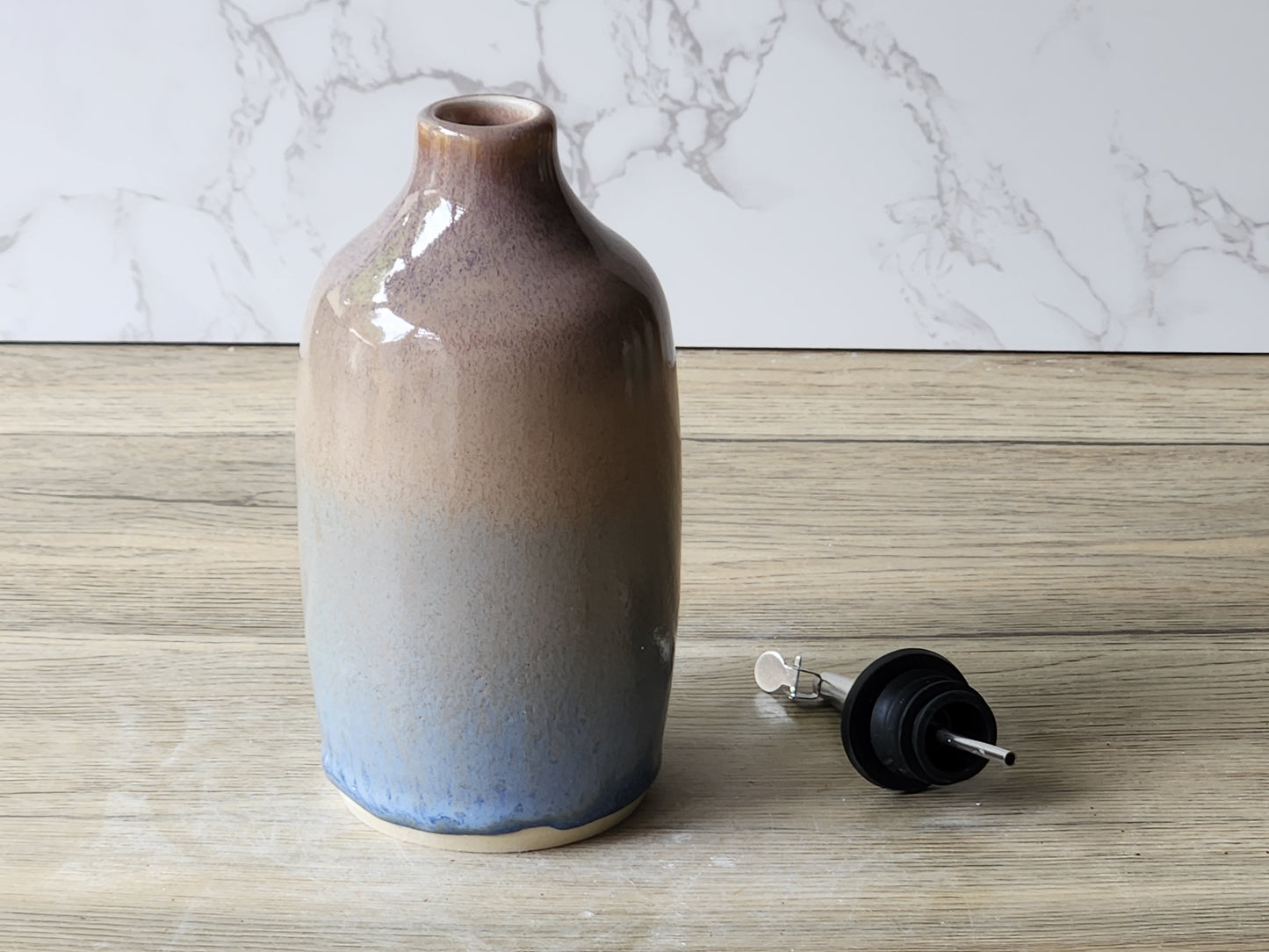 Handcrafted ceramic oil bottle with pour spout, minimalist kitchen styling