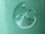 close up of the crystals on a green crystalline glazed mug