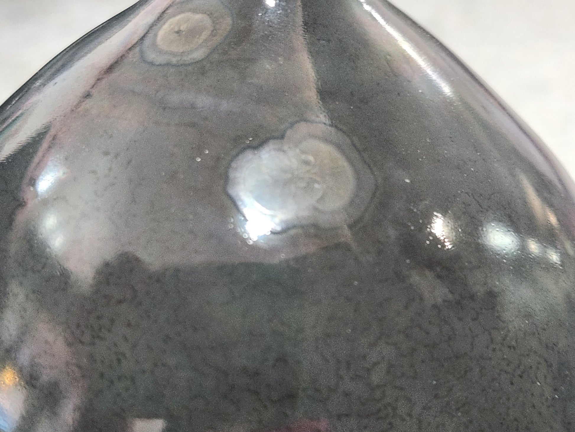 Detailed crystalline glaze texture on experimental ceramic vase