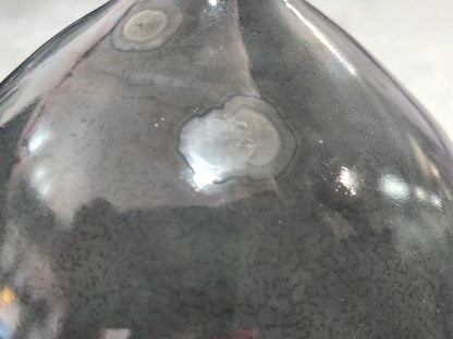 Detailed crystalline glaze texture on experimental ceramic vase