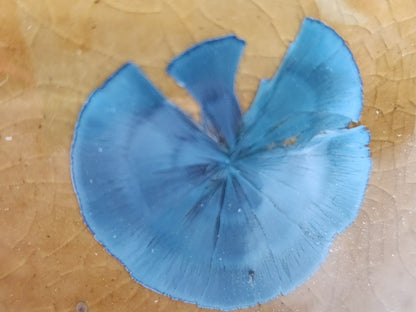 A close up of the crystal formation on this handmade pottery vase.