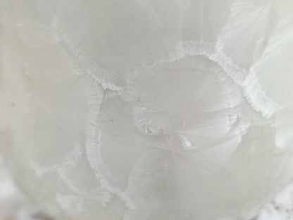 Close up of crystals on a Unique white crystalline mug gift for coffee and tea lovers