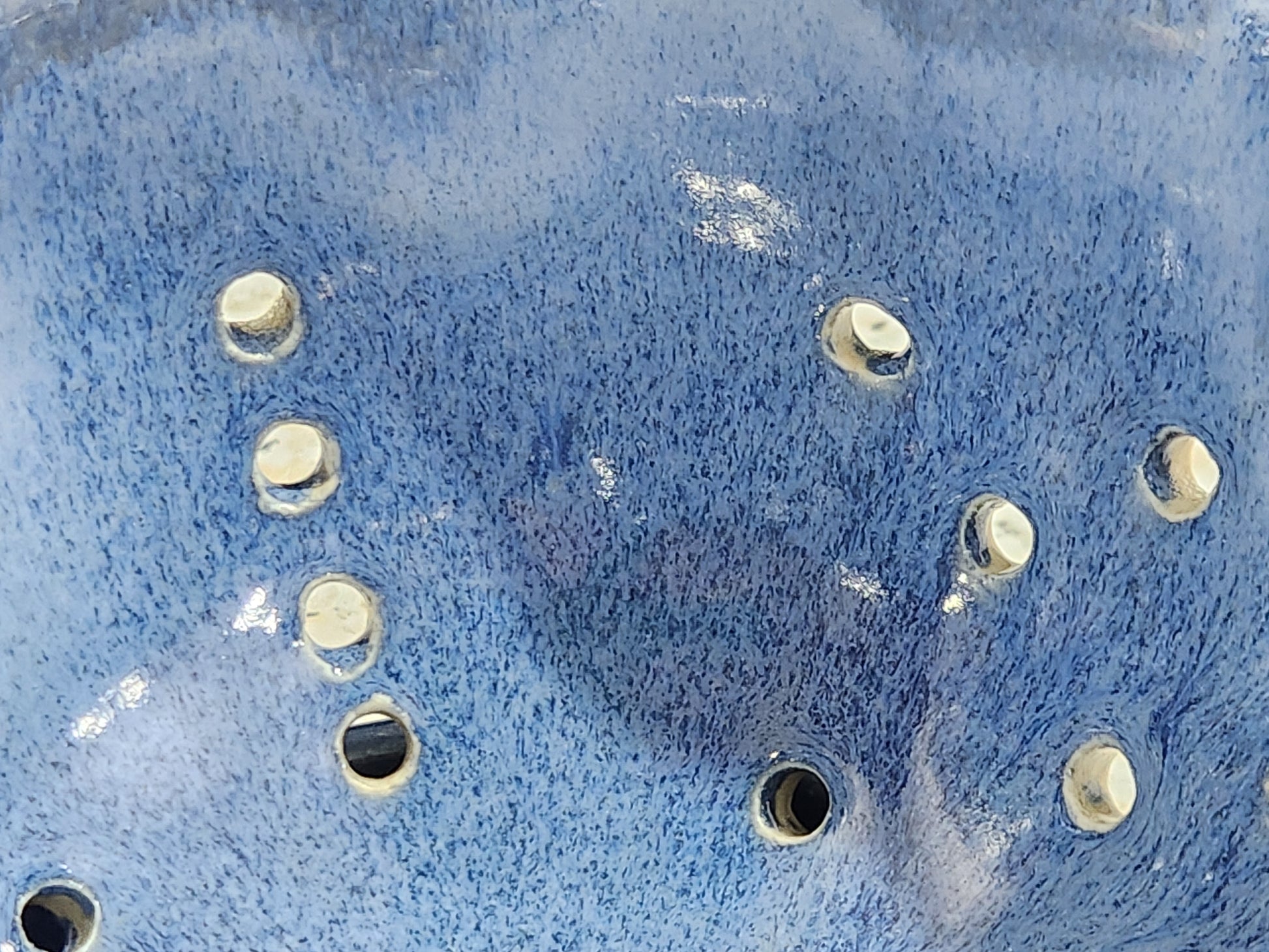 Close up of the glaze on a Wheel-thrown blue pottery berry bowl handmade in Melbourne