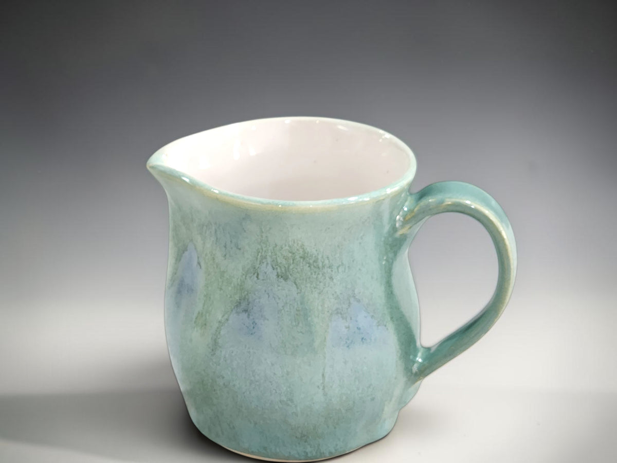 Handmade ceramic small jug with soft sea-green glaze, 250 ml