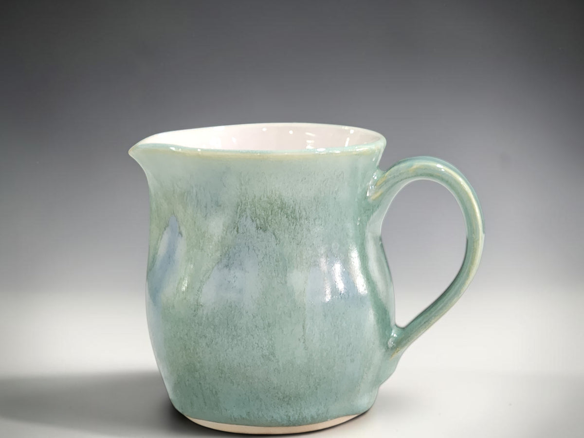Buxton Pottery handmade milk jug in green and blue glaze