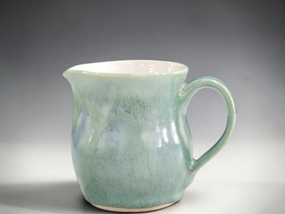 Buxton Pottery handmade milk jug in green and blue glaze