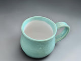 Green handmade ceramic mug for coffee or tea