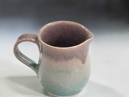 Handmade 250ml pottery jug with spearmint and oatmeal glaze