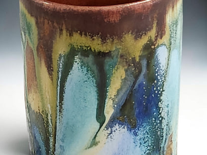Close-up of layered glaze on handmade Rustic Collection pottery tumbler