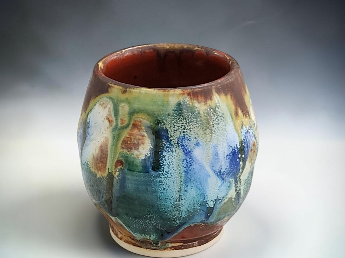 Buxton Pottery handmade whisky sipper with blue, green and brown glaze