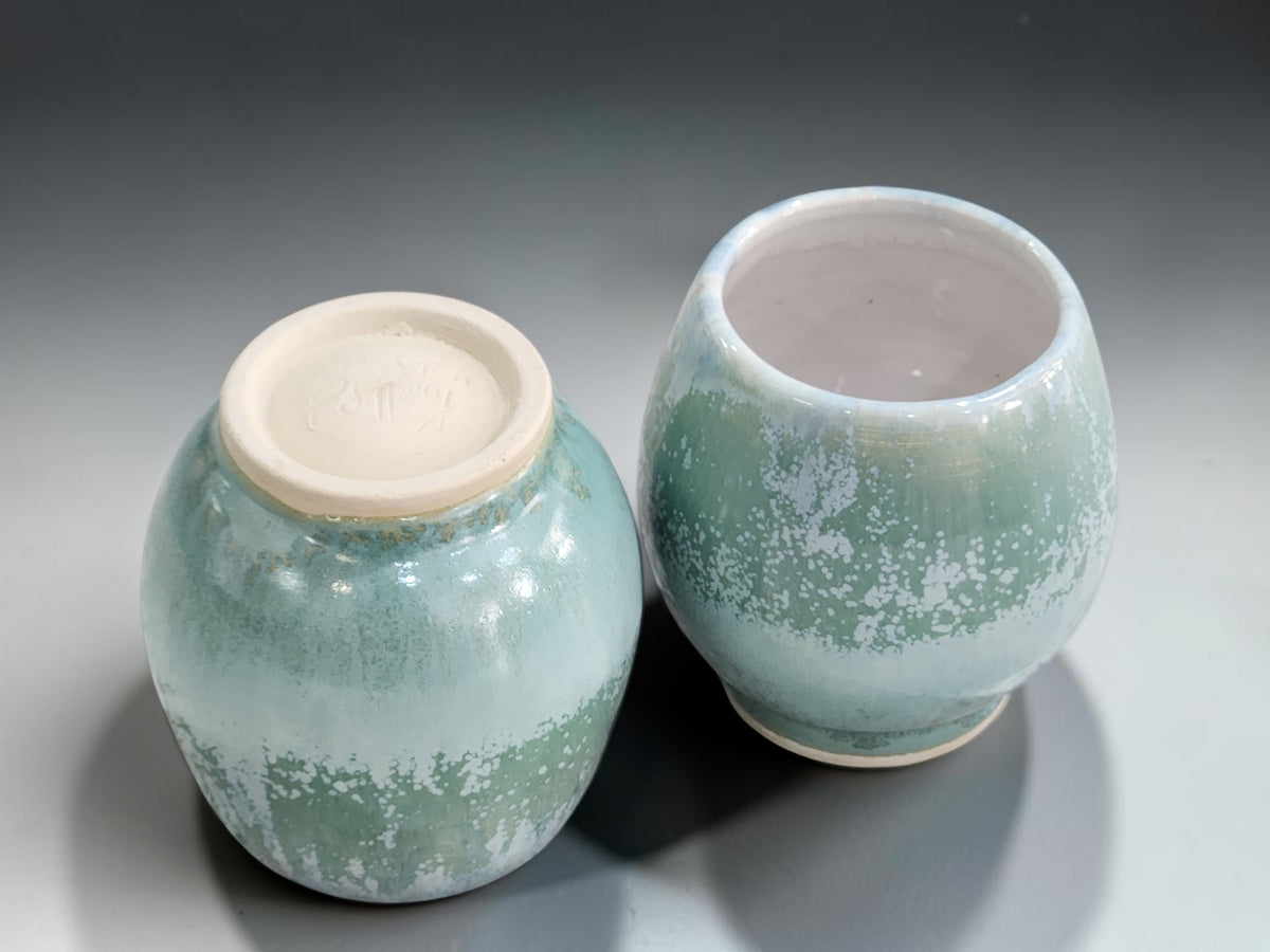 Pair of handmade 250ml tea and whisky sippers in mottled green pottery glaze