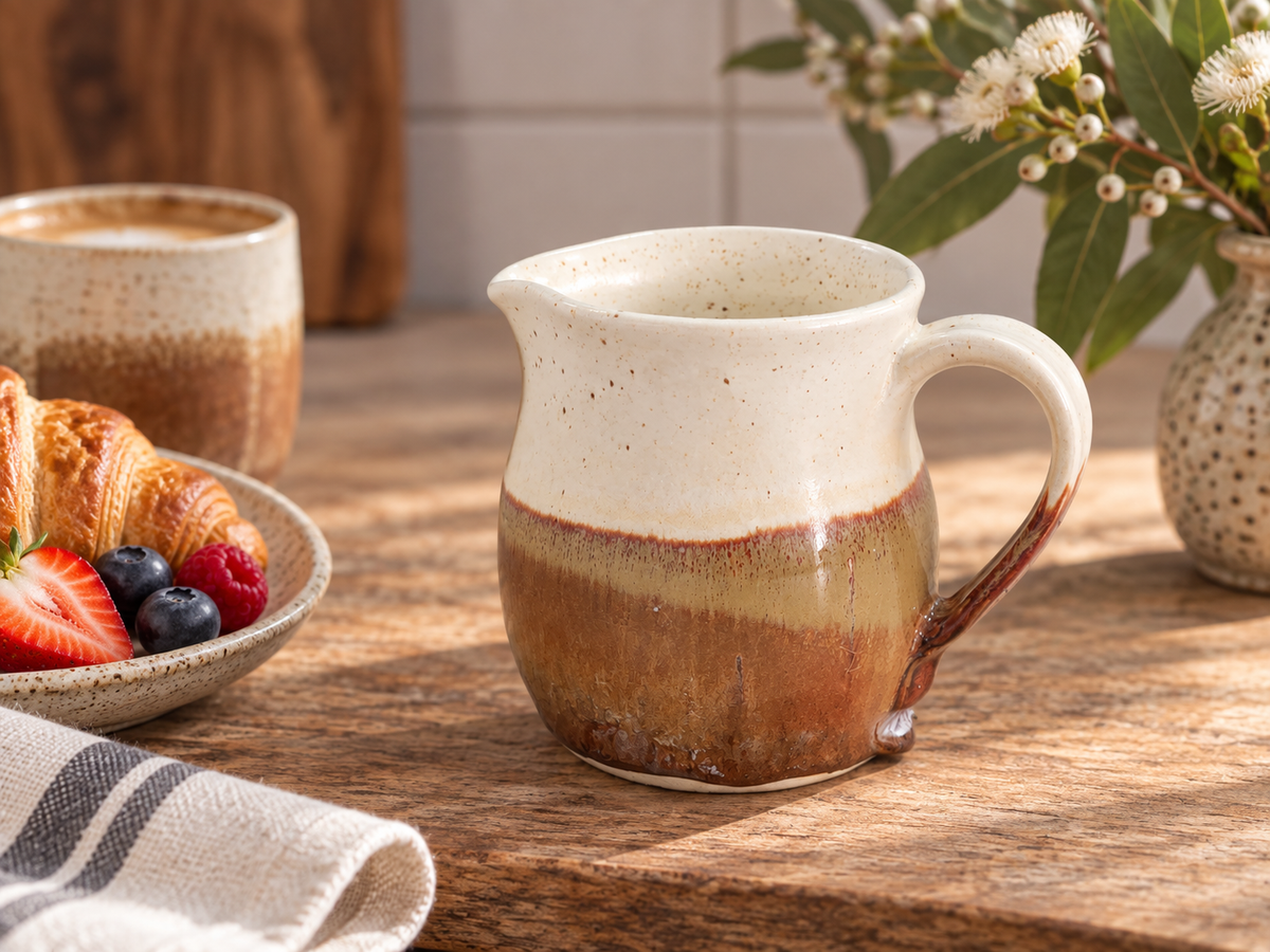 Lifestyle image of handmade 300ml ceramic jug on breakfast table