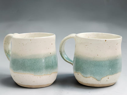 Handmade cream and green ceramic mug with mottled glaze handmade in Melbourne Australia