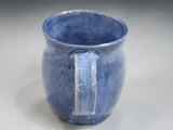 Buxton Pottery blue handmade mug photographed on neutral grey background