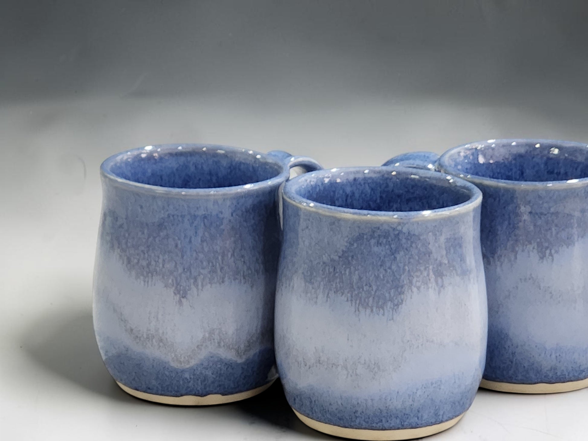 Handmade blue ceramic mug with mottled glaze handmade in Melbourne Australia