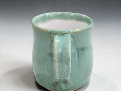 Handcrafted 300ml ceramic mugs by Buxton Pottery with smooth spearmint glaze detail