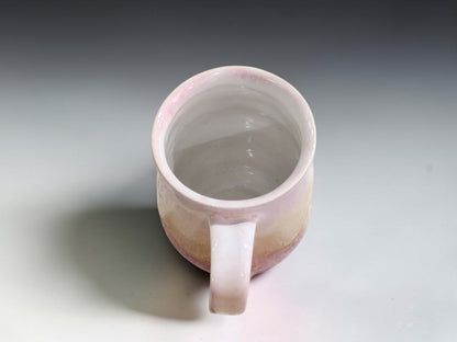 Wheel-thrown ceramic mug measuring 11.5cm tall with an 8cm belly shown from the top