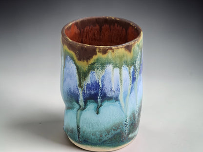 Rustic pottery tumbler with layered spray-applied glazes by Buxton Pottery