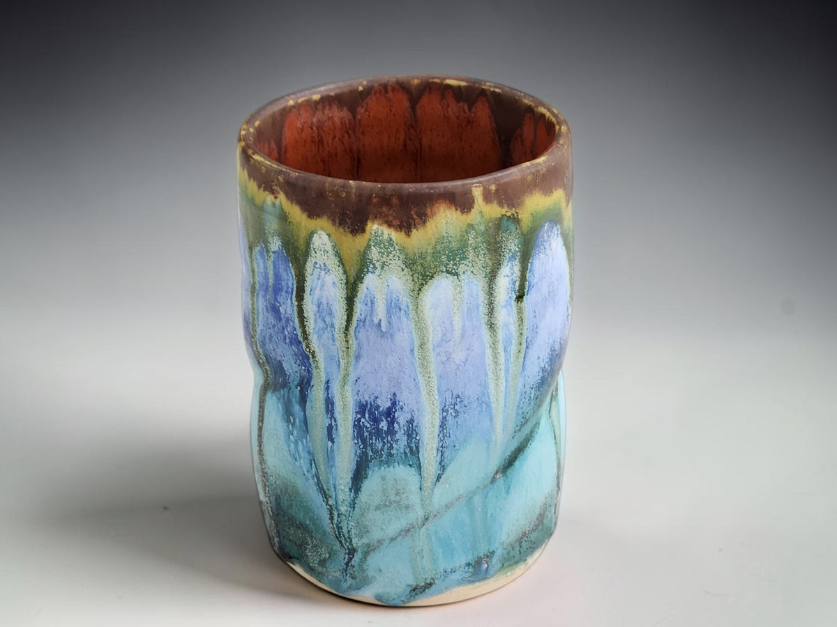 Australian handmade ceramic tumbler in earthy brown blue and turquoise glaze