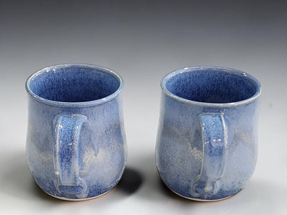 Matching pair of blue pottery mugs for everyday coffee, tea or hot chocolate