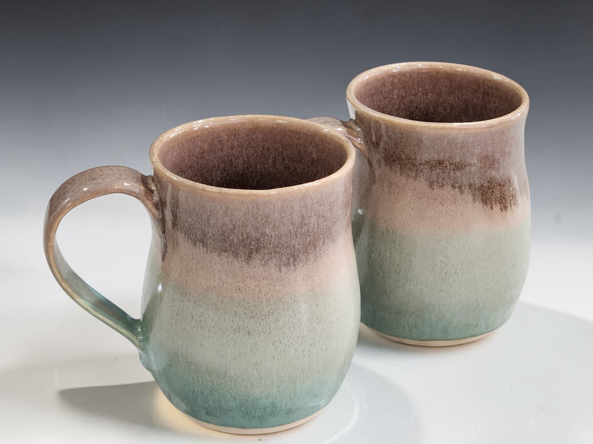 Glossy oatmeal interior of Blue Gum handmade pottery mug