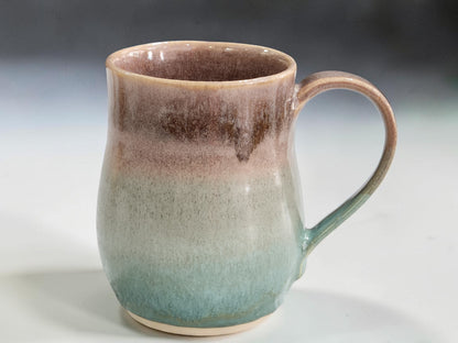 Large handmade stoneware mug with comfortable curved handle