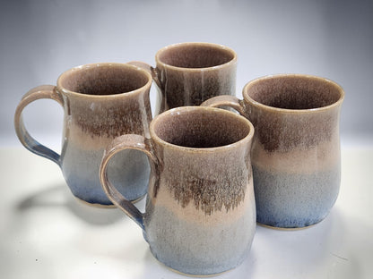 Set of four handmade ceramic mugs in oatmeal brown and soft blue glaze, 400 ml mugs made in Melbourne