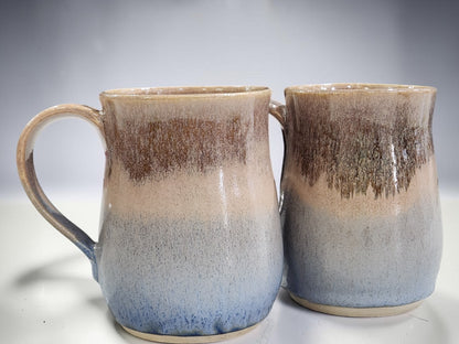 Collection of 400 ml handmade ceramic mugs with earthy oatmeal and blue finish, artisan pottery Australia