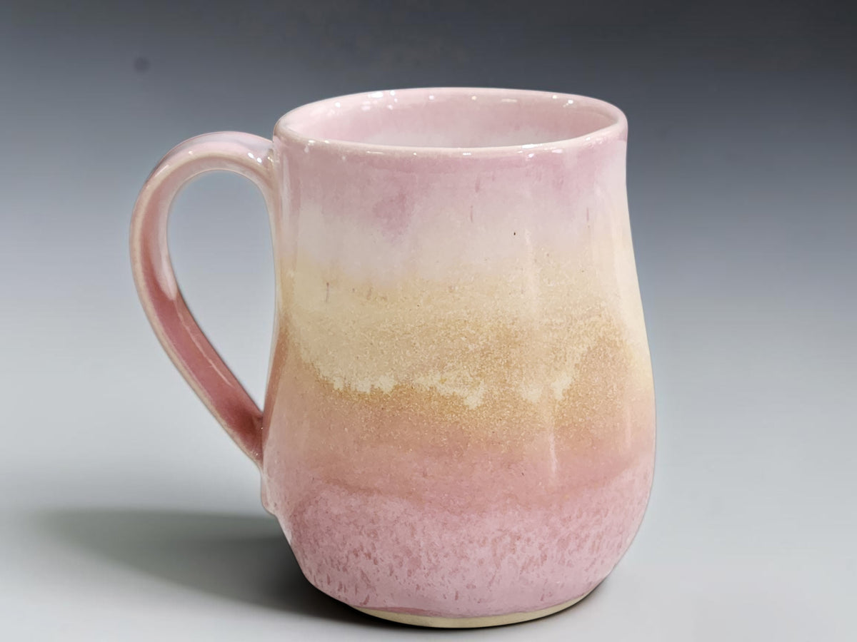 Rounded 400ml stoneware mug with tall curved handmade handle