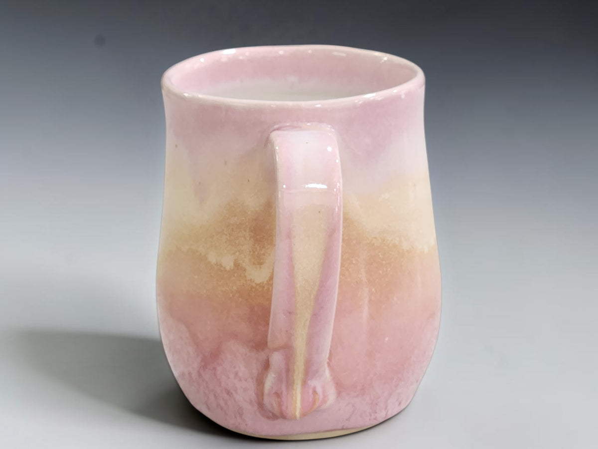 Soft pink ceramic mug handmade from durable high-fired stoneware
