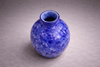 Small handmade ceramic bud vase in blue crystalline glaze, Melbourne pottery studio