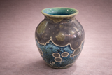 Angled top view of rim and turquoise glaze lining inside handmade galaxy glaze vase, Melbourne pottery
