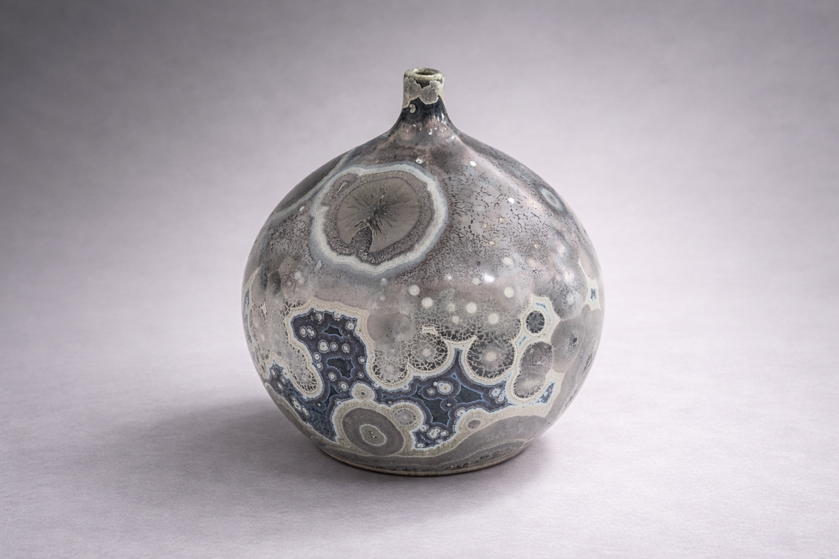 One-of-a-kind handmade pottery vase with deep galaxy crystal blooms