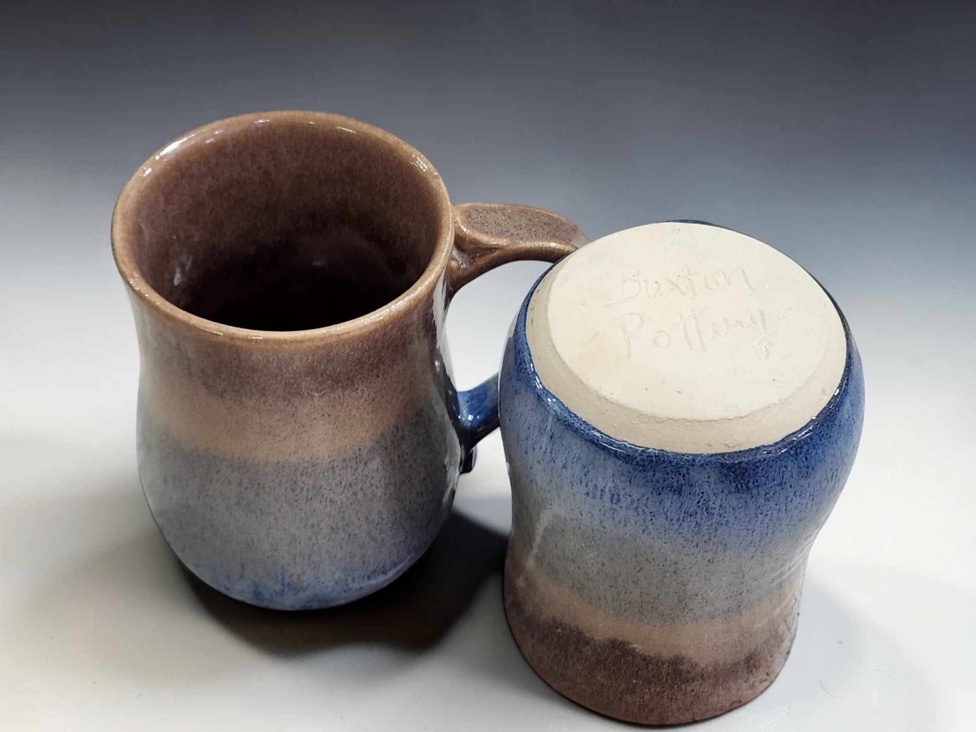 Large 500ml wheel-thrown stoneware coffee mug in layered blue and oatmeal glaze