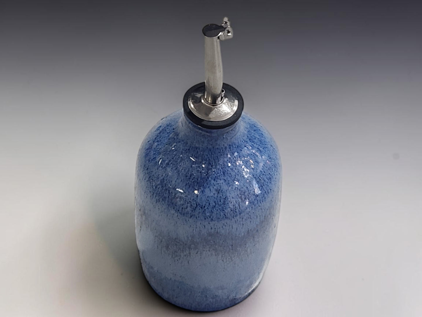 Blue pottery oil bottle with stainless steel pourer, handmade ceramic kitchenware Melbourne
