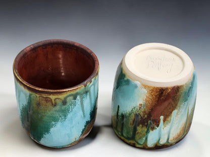 Base of handmade ceramic tumbler showing Buxton Pottery maker's mark