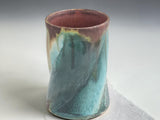 Handmade pottery coffee mug with turquoise, earthy brown and cream flowing glaze from the Bush Creek Earth Collection
