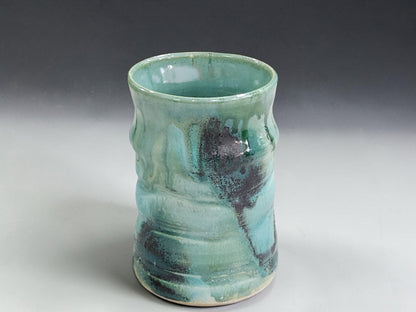 Australian handmade pottery mug with unique Bush Creek glaze variations and organic surface movement