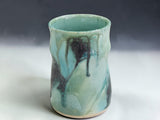 Bush Creek Collection handmade ceramic mug with layered aqua green and earthy glaze variations