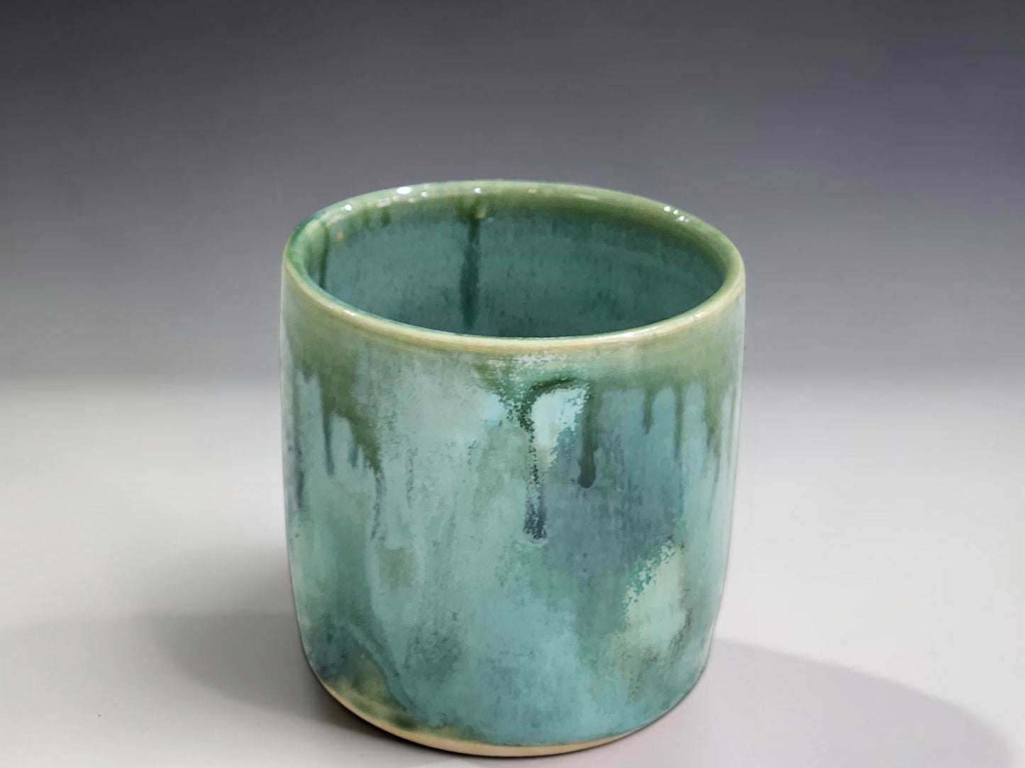 Australian handmade ceramic tumbler in Bush Creek Mist colourway, ideal for water, wine or tea