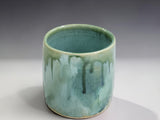 One-of-a-kind handmade ceramic tumbler with layered green, aqua and earthy glaze tones