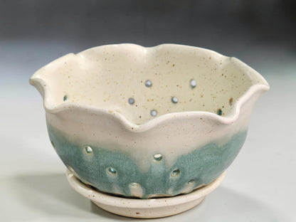 Ceramic berry bowl with scalloped rim and strawberries