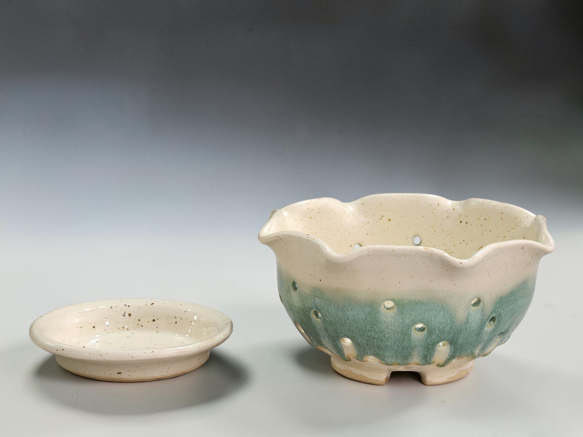 Speckled cream and spearmint green berry bowl with saucer